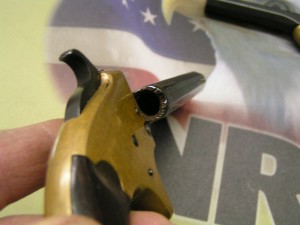 This particular derringer is known as a “swivel breech, double barrel pocket pistol”.