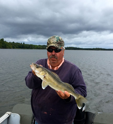 Big Mike with a 22½-inch walleye. (photo by Steve Weisman)