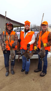 (L to R) Success! Julie Beehler, Kristi Franker, Kaylee Iedema with the roosters that they bagged.