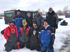 Top four teams at Stan’s Emerson Bay Bluegill Tournament. (L to R-kneeling) Tyler Evers and Jamie Kuiawa, first place; Colby Kraninger and Keith McCormick, second place. (L to R-standing) Rod Blau and Calvin Grosvenor, third place; Travis Frazee and Darren Jones, fourth place.