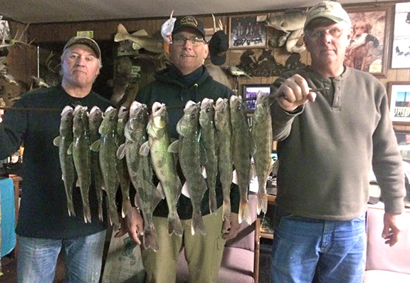 (L to R) Max Strube, Dean Jacobson and Terry Thomsen, members of the IGLFC,  with a nice limit of walleyes.