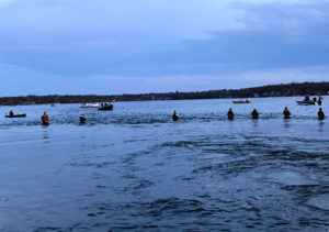 (photo by Steve Weisman) Current coming from the spillway on Big Spirit to the north end of East Okoboji attracted by walleyes and anglers the Saturday evening of Walleye Opener.